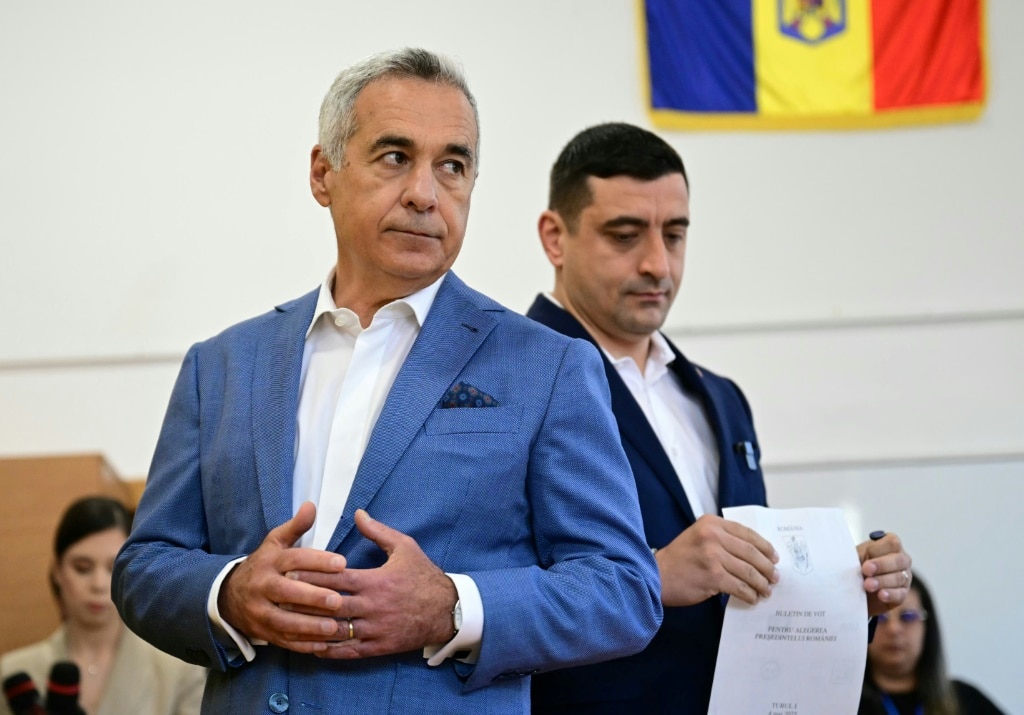 Romanians return to polls as far right hopes to win presidential rerun