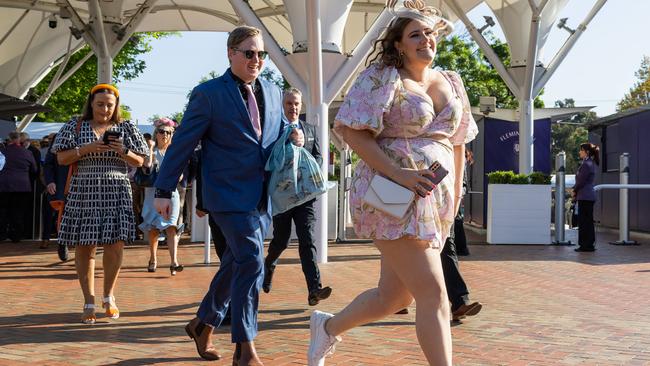 Keen racegoers make their early entrance. Picture: Jason Edwards