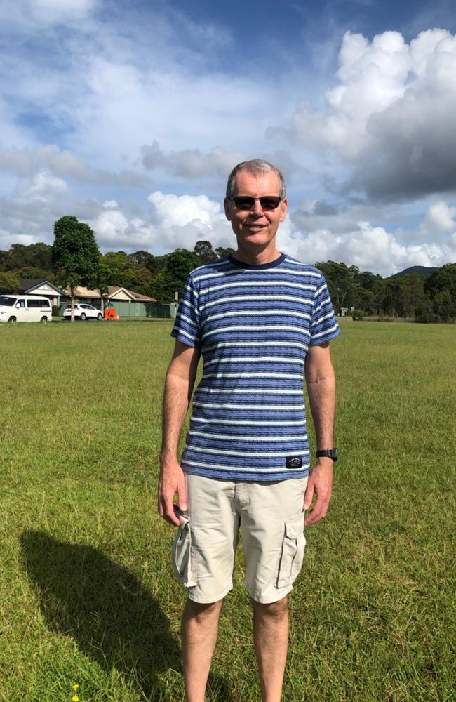 Grant Geytenbeek standing in front of the site of the proposed project.