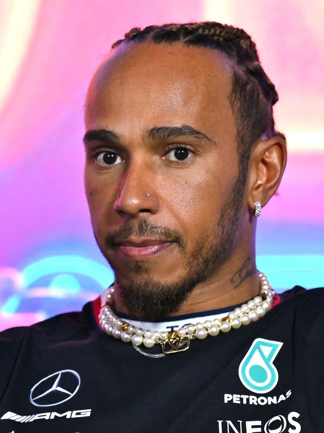 Lewis Hamilton’s move to Ferrari has shocked F1. (Photo by ANGELA WEISS / AFP)