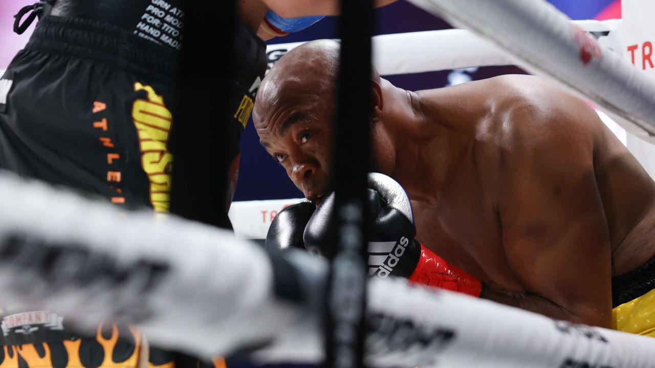 Evander Holyfield vs Vitor Belfort boxing, Tito Ortiz KO video, Anderson  Silva fight result | The Chronicle