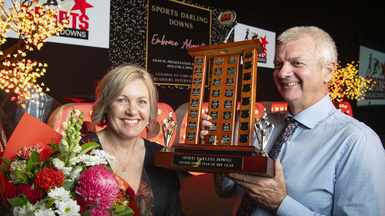 Kathy and Darren Stewart with the Sports Darling Downs Senior Sports Star of the Year trophy awarded to their daughter Tatum Stewart. Picture: Kevin Farmer