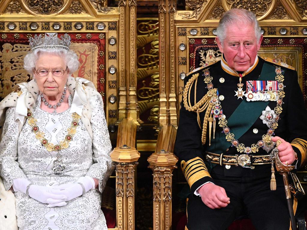 Queen Elizabeth II and her son, now known as King Charles III, during the State Opening of Parliament at the Palace of Westminster on October 14, 2019 in London, England. Picture: Paul Edwards / Getty Images.