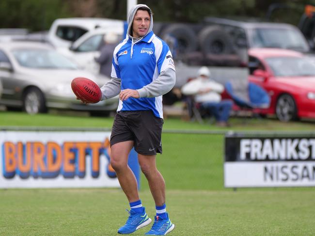 Mark Baguley in the warm up before his 100th game for Langwarrin. Picture: Paul Churcher