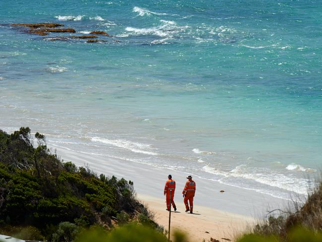 SES volunteers search the shoreline. Picture: Frank Monger