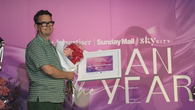 Geoff Cobham accepts the award on behalf of Roz. 6th March 2025 Picture: Brett Hartwig