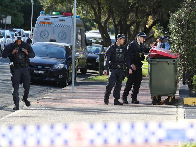 Police investigating the scene of the fatal shooting in Parramatta. Picture: Max Mason-Hubers