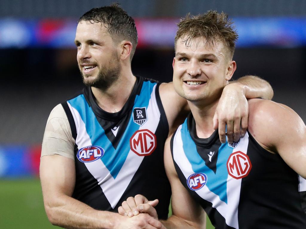 MELBOURNE, AUSTRALIA - AUGUST 20: Travis Boak (left) and Ollie Wines of the Power celebrate during the 2021 AFL Round 23 match between the Western Bulldogs and the Port Adelaide Power at Marvel Stadium on August 20, 2021 in Melbourne, Australia. (Photo by Michael Willson/AFL Photos via Getty Images)
