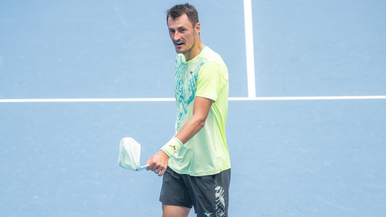 Tomic snubs media after 61-minute Aus Open disaster