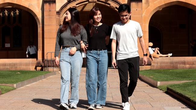 International students walking through the quadrangle at the University of Sydney.