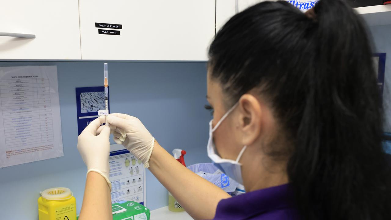 A nurse prepares one of the first doses of the coronavirus vaccine in Australia. Picture: Mark Evans/Getty Images