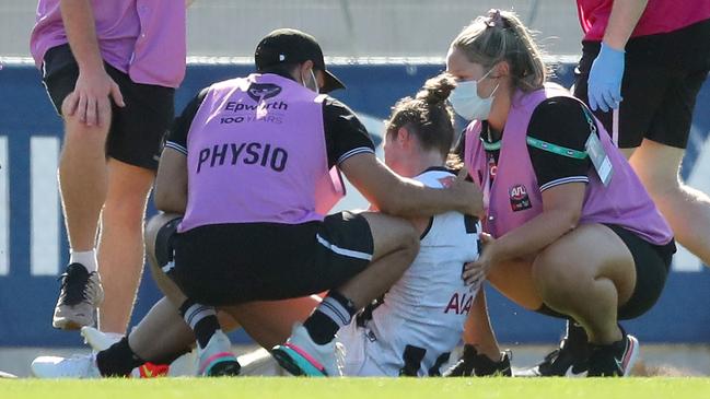 Davey receives medical attention after injuring herself at Ikon Park.