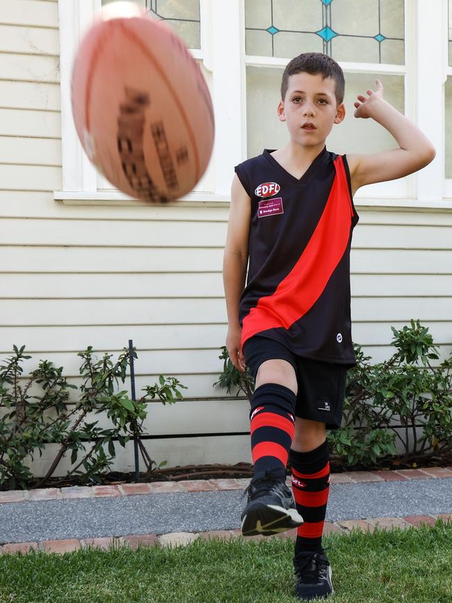 Cost of living and the added expense of kids sports uniforms. Leo Woodburn, 9, plays Australian Rules Football. Picture: Ian Currie