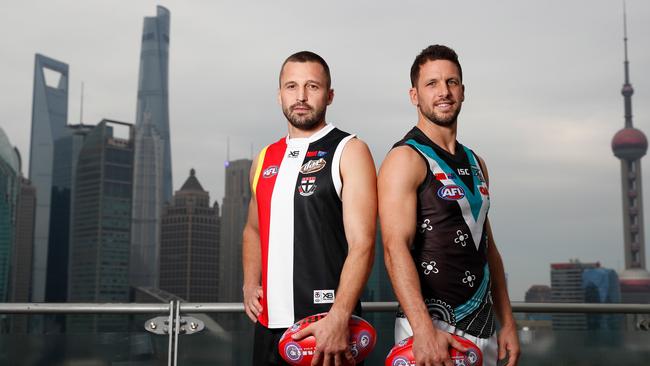 Jarryn Geary of the Saints and Travis Boak of the Power pose for a photograph ahead of the 2019 Port Adelaide and St Kilda Shanghai match. Picture: Michael Willson/AFL Photos