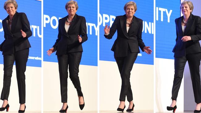 Theresa May kicks up her dancing heels. Photo: AFP