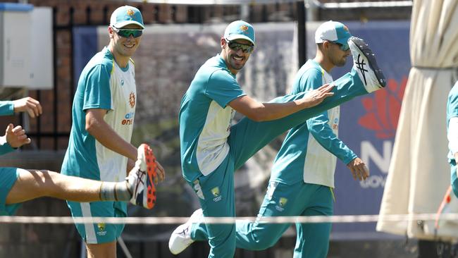 Mitchell Starc, centre, with Cameron Green returns to the Australian camp. Picture: Phil Hillyard