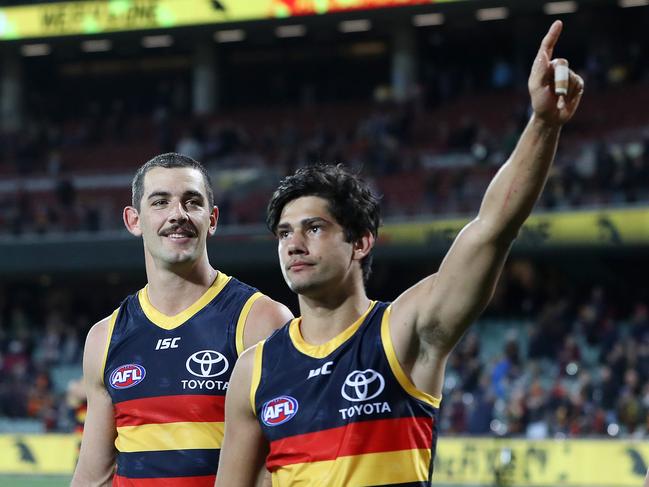 AFL - Tuesday, 8th September, 2020 - Adelaide Crows v GWS Giants at the Adelaide Oval. Adelaide's Shane McAdam, Adelaide's Taylor Walker and Adelaide's Tyson Stengle after the win Picture: Sarah Reed