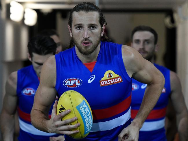 GOLD COAST, AUSTRALIA - JULY 23:Marcus Bontempelli of the Bulldogs leads his team out during the round 8 AFL match between the Gold Coast Suns and Western Bulldogs at Metricon Stadium on July 23, 2020 in Gold Coast, Australia. (Photo by Matt Roberts/AFL Photos/via Getty Images)