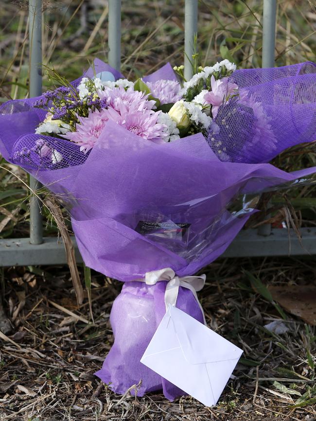 Flowers placed at the site of the fatal fire. Picture: Darren Pateman/AAP