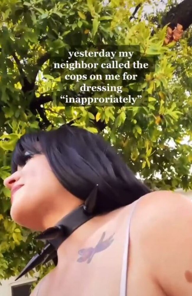 A woman has shared a video of police approaching her after a neighbour called the cops because of her ‘inappropriate’ outfit. Picture: TikTok/rovi_wade