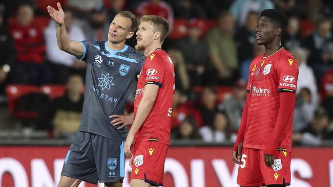 SOCCER - A-LEAGUE - Adelaide United v Sydney at Coopers Stadium. VAR - Alexander Wilkinson and Ben Halloran and Al Hassan Toure watch - Toure goal - which was later confirmed Picture SARAH REED