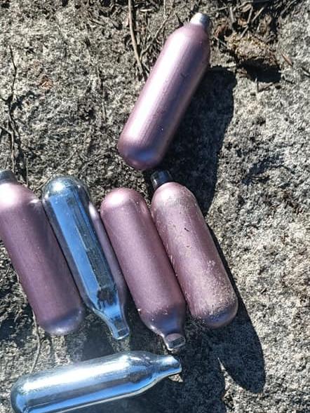 Gas cylinders provide dumped after getting people “high” during rave at North Head. Picture: supplied