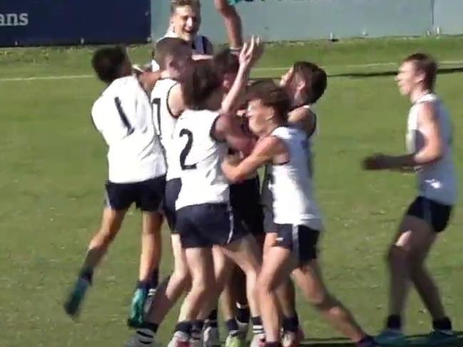 Vic Country teammates celebrate the win. Picture: AFL Play Youtube