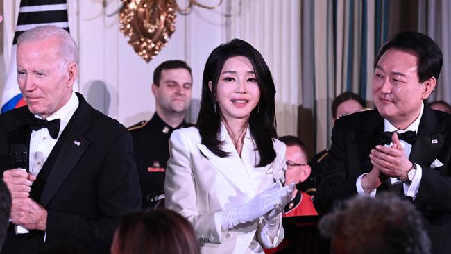 US President Joe Biden (L) speaks alongside with Yoon Suk Yeol and his wife Kim Keon Hee during a State Dinner at the White House in 2023. Picture: AFP.