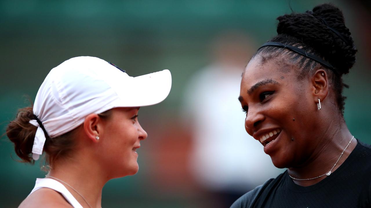 Ash Barty and Serena Williams at the 2018 French Open. (Photo by Clive Brunskill/Getty Images)