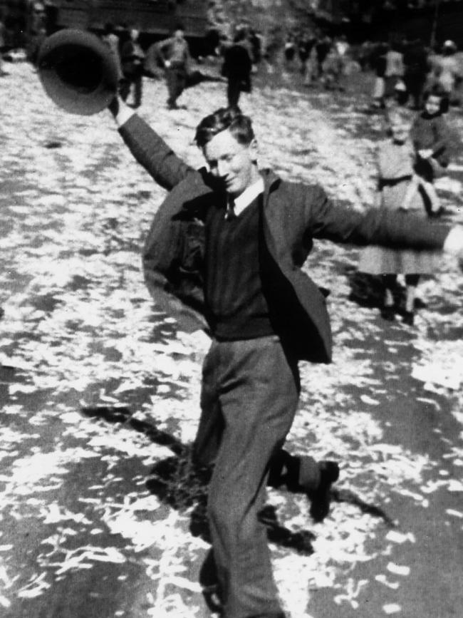 The “dancing man” celebrates the end of WWII at Martin Place in 1945.