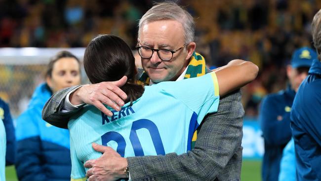 Anthony Albanese hugs Sam Kerr after the loss to Sweden. Picture: Adam Head