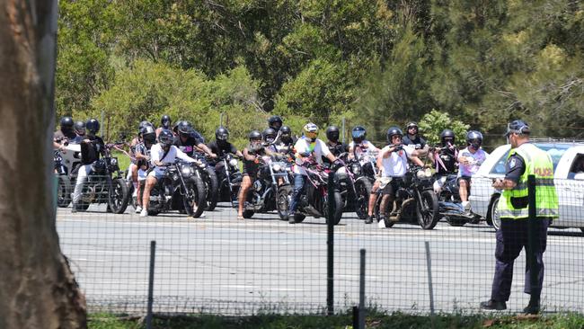 The hearse arrives escorted by motorbikes. Picture Glenn Hampson