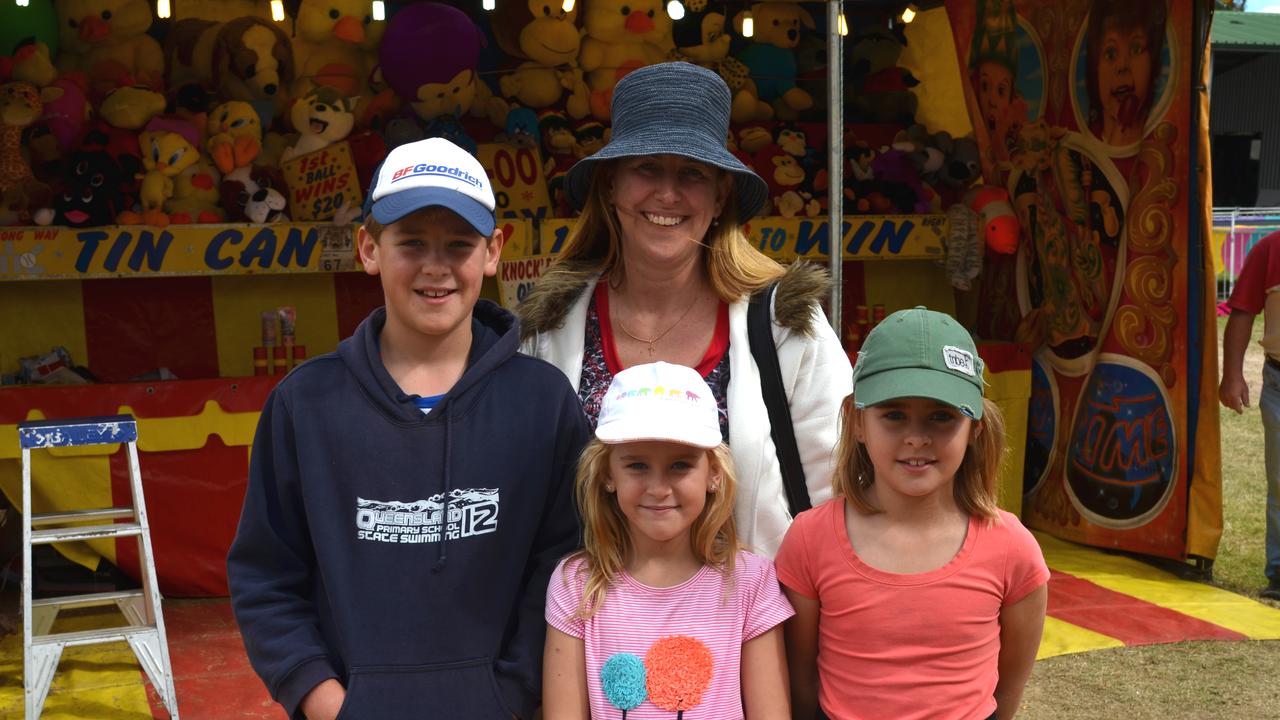 Seamus Ryan with sisters Niamh and Nella and mum Sharon at the Warwick Show in 2013. Photo Georja Ryan / Warwick Daily News