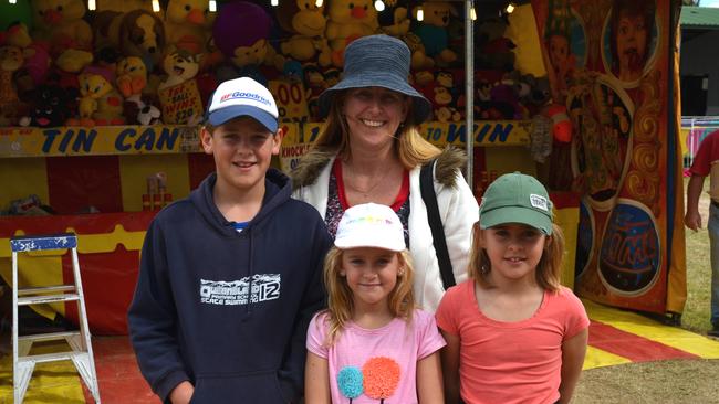 Seamus Ryan with sisters Niamh and Nella and mum Sharon at the Warwick Show in 2013. Photo Georja Ryan / Warwick Daily News