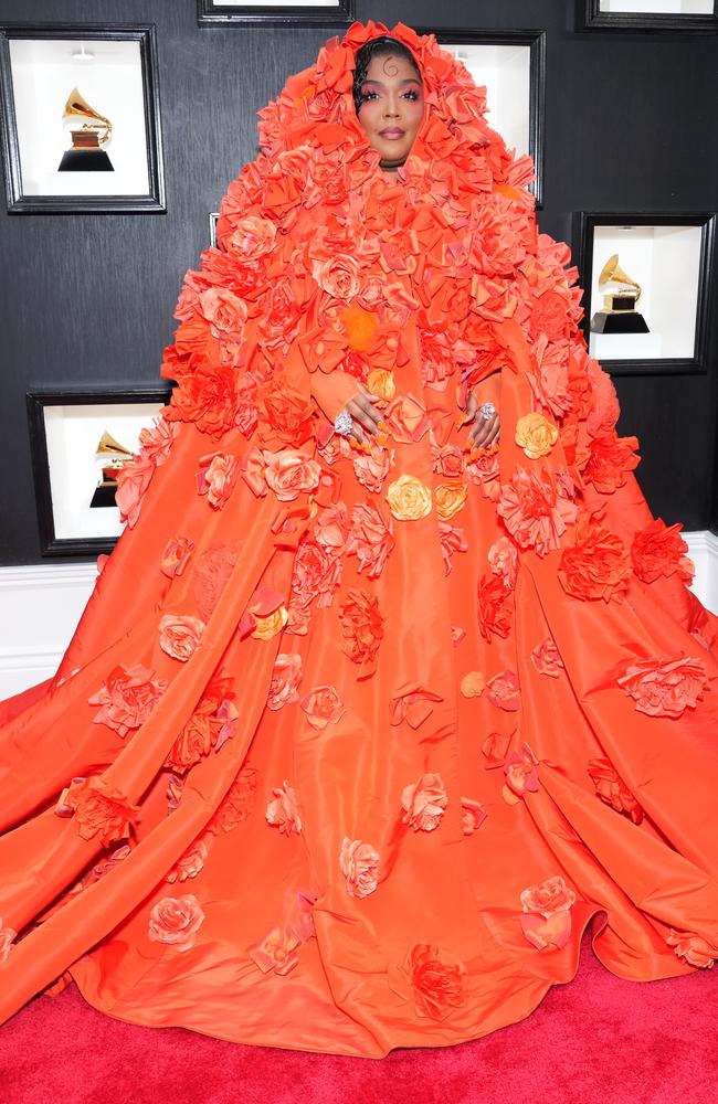 Lizzo attends the 65th Grammy Awards dressed in a floral cape. Picture: Getty Images