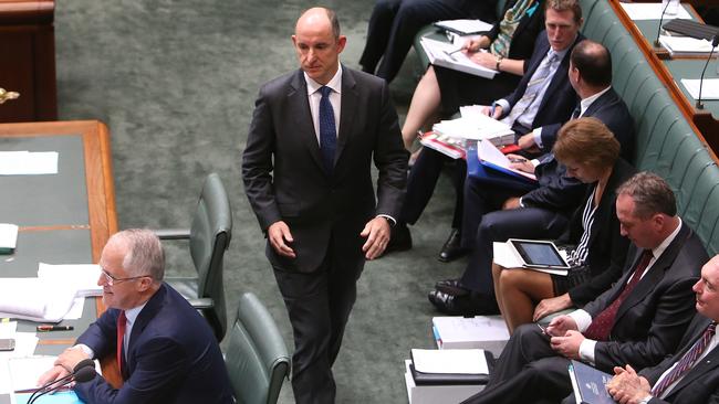 PM Malcolm Turnbull and Minister for Human Services and Veterans Affairs Stuart Robert in Question Time in the House of Representatives Chamber, Parliament House in Canberra.