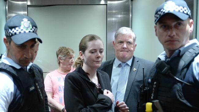 Police media officer Jessica Oxford and her father Chief Inspector Russell Oxford at the announcement of the arrest of John Bowie this week. Picture: Jeremy Piper