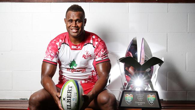 Reds giant winger Eto Nabuli with the Global Rugby Tens trophy. Picture: Jack Tran