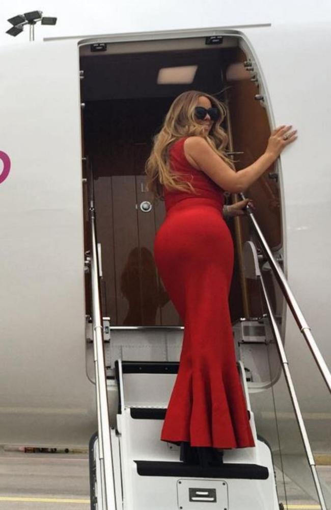 Skin tight ball gown = perfect flight wear. Picture: Instagram