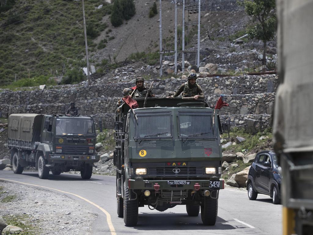 An Indian army convoy moves on the Srinagar-Ladakh highway on Wednesday. Picture: AP