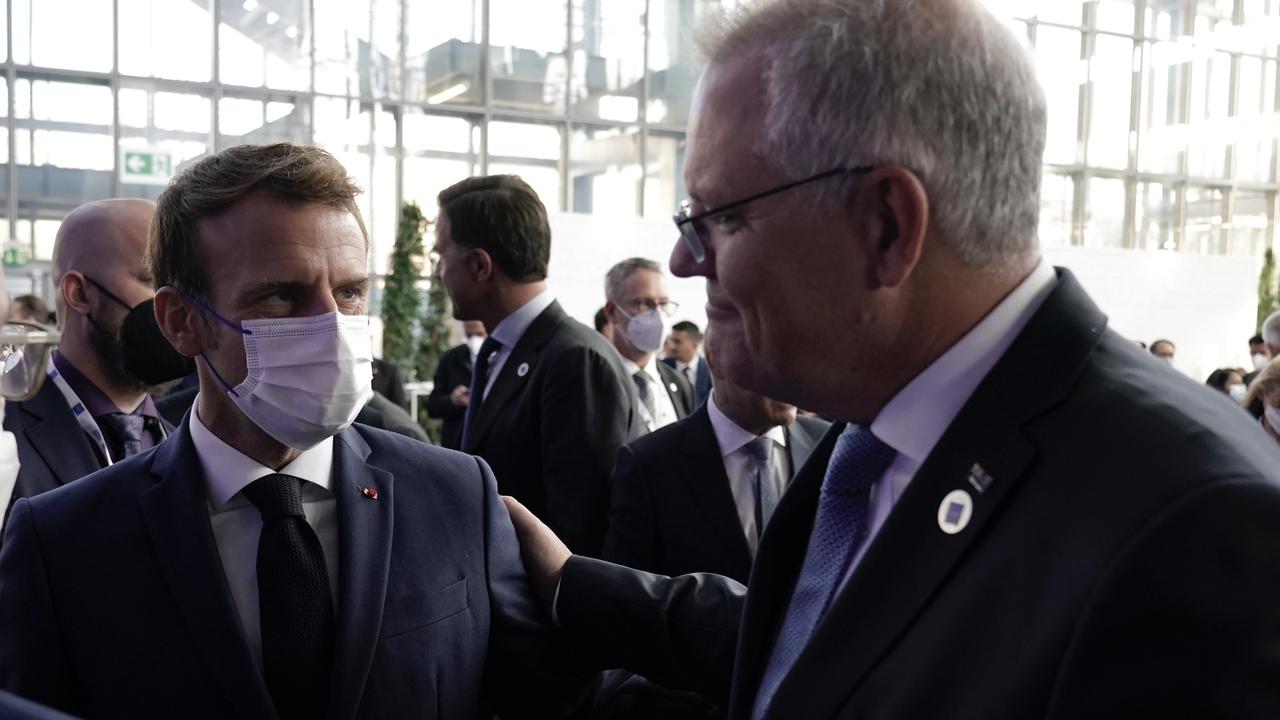 Scott Morrison said he put his arm on Emmanuel Macron’s shoulder and said “g’day”. Picture: Adam Taylor