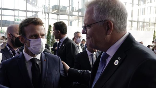 Scott Morrison said he put his arm on Emmanuel Macron’s shoulder and said “g’day”. Picture: Adam Taylor