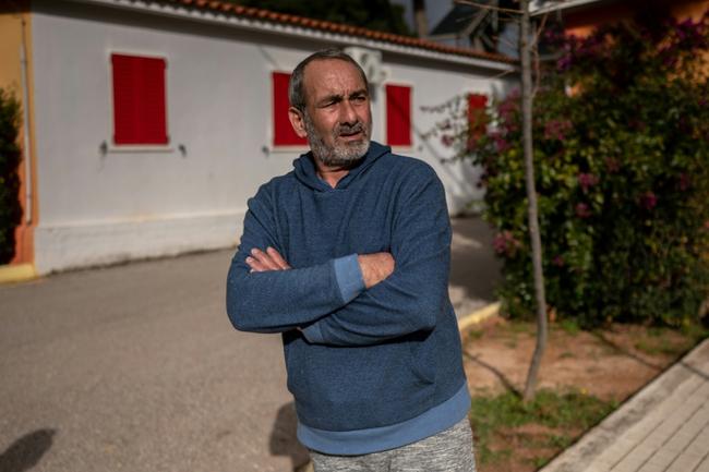 Santorini refugee Ilias Roussos, 54, in a camp for people fleeing the island near Athens