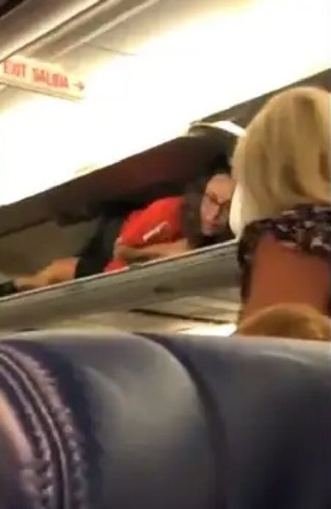 In 2019, a Southwest Airlines flight attendant was also spotted laying in the overhead compartment of a plane as passengers were boarding. Picture: X/Veronica Lloyd