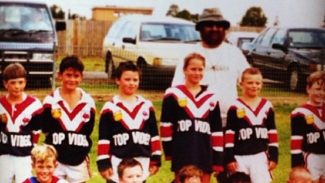 Dale Finucane (second from left) and Kezie Apps (back row) playing for the Bega Roosters.