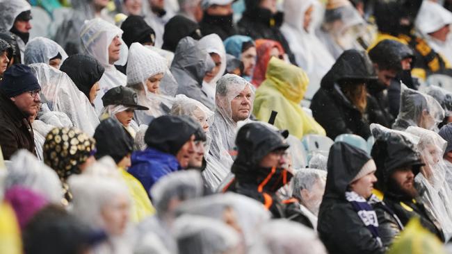 The ponchos are set to be out in force this weekend. File image: AAP Image/Michael Dodge