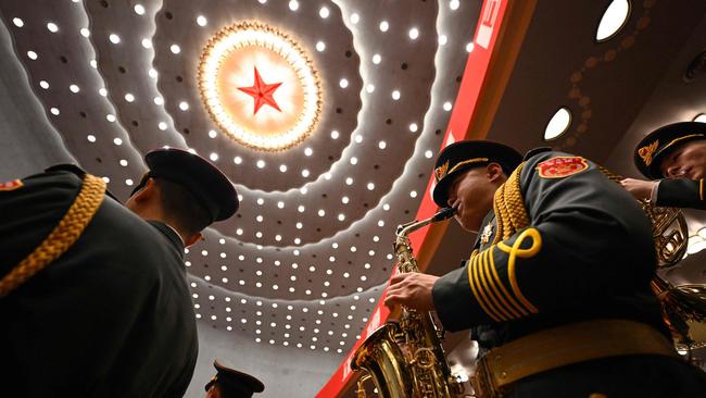 The People's Liberation Army band performs during the opening session of the 20th Chinese Communist Party's Congress at the Great Hall of the People in Beijing on October 16, 2022. (Photo by Noel CELIS / AFP)