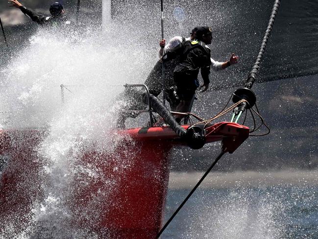 Master Lock Comanche competes in the 2024 SOLAS Big Boat Challenge on Sydney Harbour in Sydney on December 10, 2024. (Photo by SAEED KHAN / AFP) / -- IMAGE RESTRICTED TO EDITORIAL USE - STRICTLY NO COMMERCIAL USE --