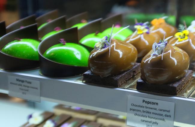 The Mango Yuzu and Popcorn mousse cakes at Koi’s Macquarie Centre dessert bar.