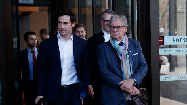 Journalists Nick McKenzie and Chris Masters with Nine’s legal team after the judgment in Ben Roberts Smith v Nine. Picture: Nikki Short